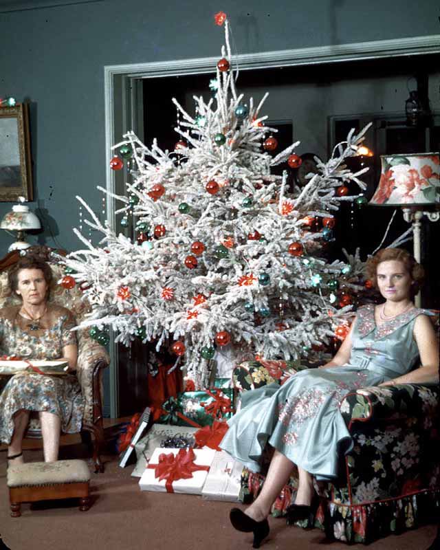 Photos of women posing with their Christmas trees (1950s/60s)Love them all.Enjoy!!