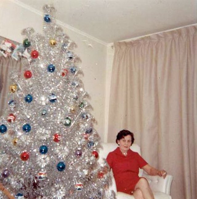 Photos of women posing with their Christmas trees (1950s/60s)Love them all.Enjoy!!