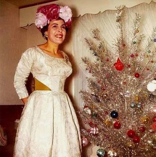 Photos of women posing with their Christmas trees (1950s/60s)Love them all.Enjoy!!