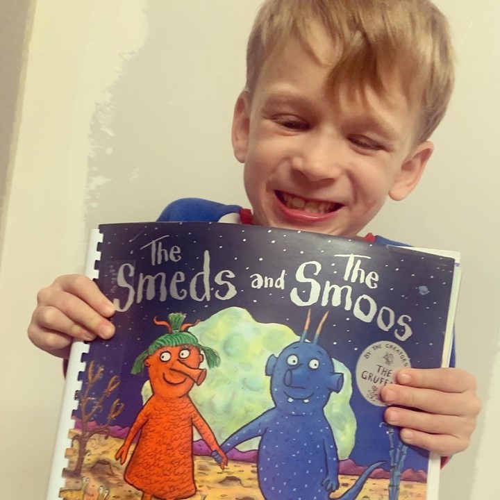 Fearnecotton's tweet photo. Here's Jai &amp; Jacob, both 7 &amp; visually impaired, with happy smiles &amp; feeling the joy that @LivingPaintings books bring. Please sign up to the #BigChristmasRead to raise vital funds for their free, postal library for blind and partially sighted children. https://t.co/4Vt5LOxi0T https://t.co/AzlGCnoTgm