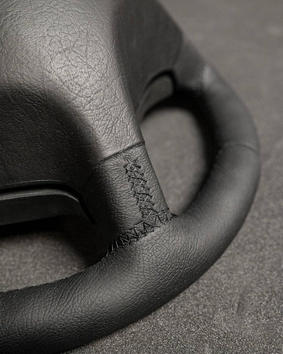 dclassauto's tweet image. Mercedes W124 wheel we retrimmed in black Mercedes grained leather with matching black stitching. #dclassauto #mercedes #w124 #eclass #retrim #trimming #autoupholstery