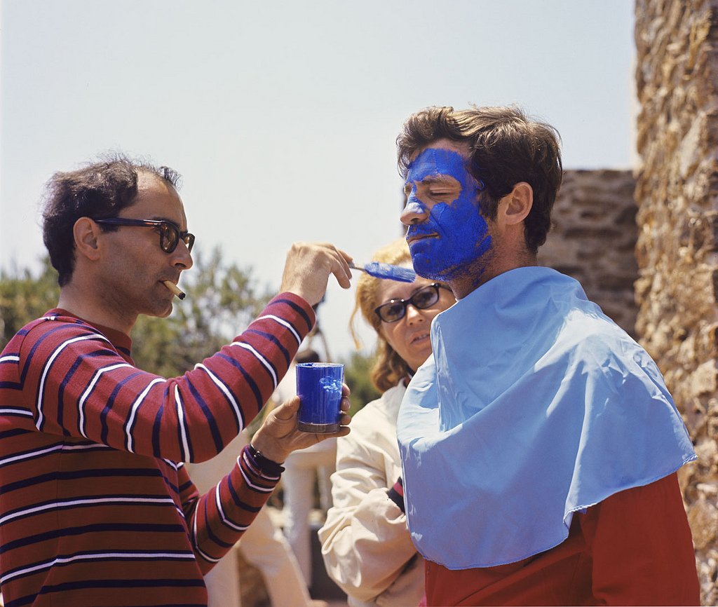 Jean-Luc Godard painting Jean-Paul Belmondo's face for 'Pierrot le Fou' (1965)