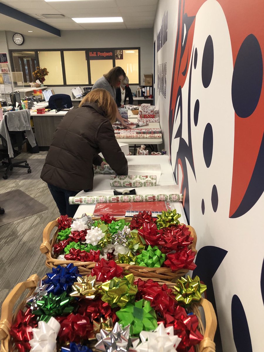 FTMSJaguars's tweet photo. FT office staff spreading some holiday cheer by wrapping gifts for staff. One less task to tackle in December. We appreciate you! #ftpride #happyholidays https://t.co/N12slcdFt4