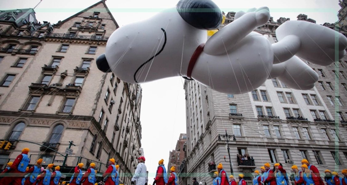 The Snoopy balloon floats down Central Park West during the 2014 Macy's Thanksgiving Day Parade. Kena Betancur/AFP via Getty Images