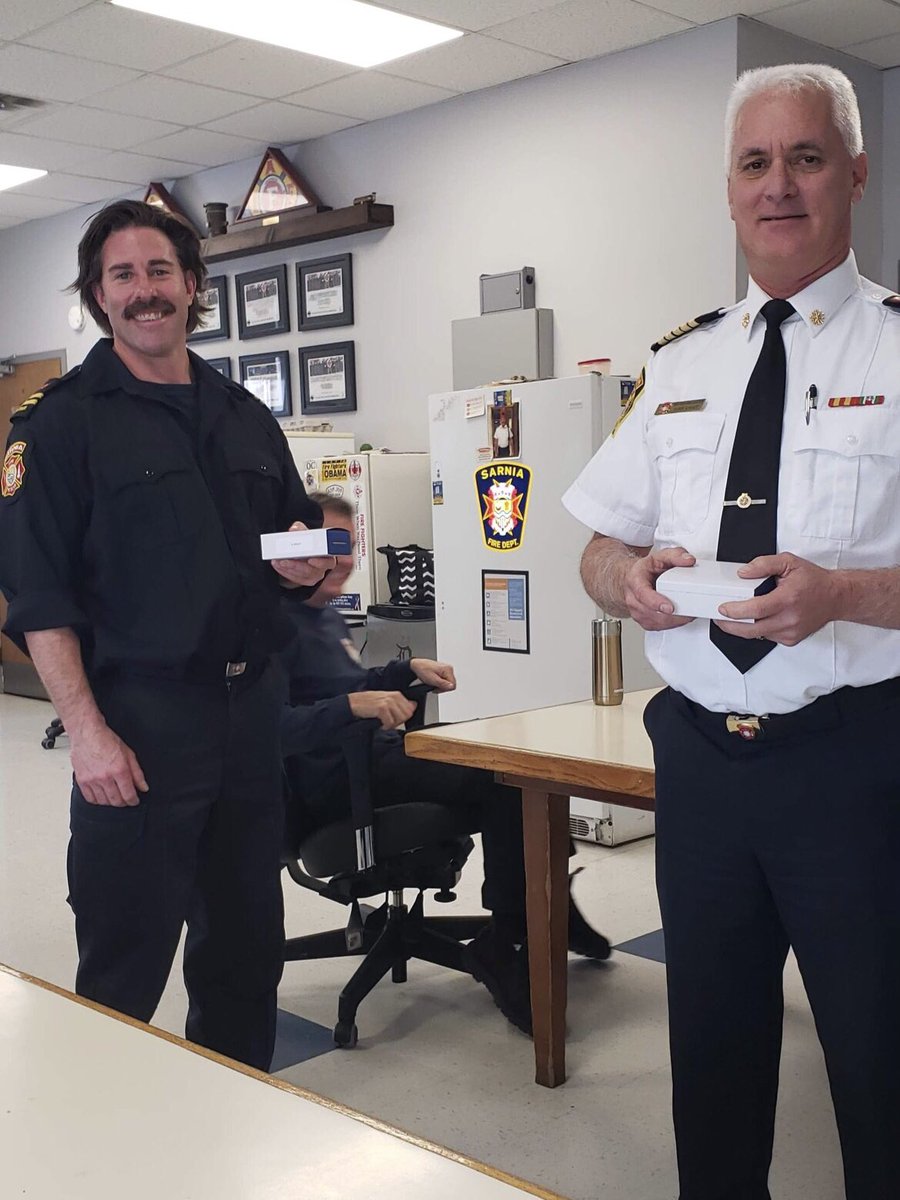 Chief <a href="/Bryan_Van_Gaver/">Bryan Van Gaver</a> presents <a href="/SarniaFire/">Sarnia Fire Rescue</a> Firefighter Dave Knight his Fire Services Exemplary Service Medal which honours members of a fire service who have completed 20 years of service with at least 10 that have been in the performance of duties involving potential risks.