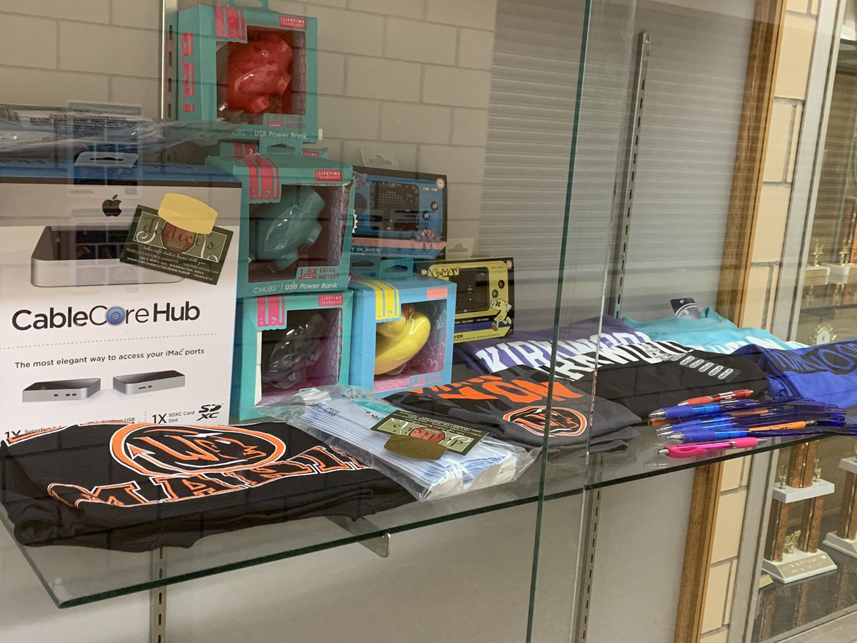 Jesikarose7's tweet photo. Check out the silent auction prizes in the display case by the gym! https://t.co/VUM1taoqtY