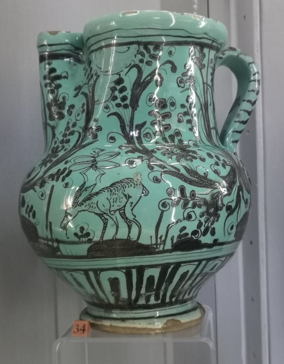 A tin-glazed jug (c.1600) and a tin-glazed charger with lustre decoration (mid-16th century) from Spain, both in the Royal Cornwall Museum.