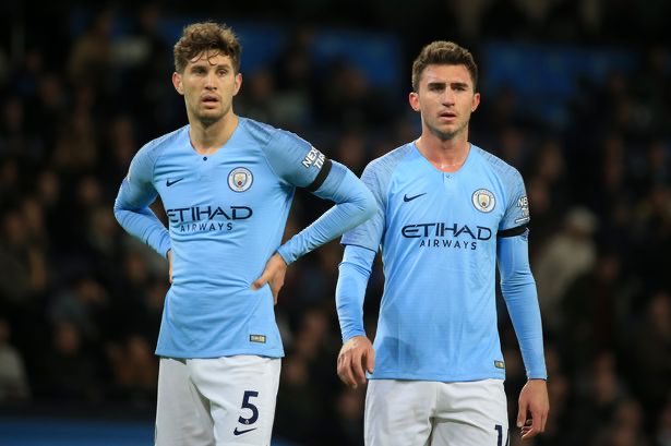 Laporte/Stones.Laporte had a bad game against Spurs and was dropped for John Stones who, with seemingly new motivation, has performed well against Olympiakos and Burnley.Pep’s quotes suggest Stones might have just sneaked ahead of Laporte in the pecking order at the moment.  https://twitter.com/city_xtra/status/1333397088009396224