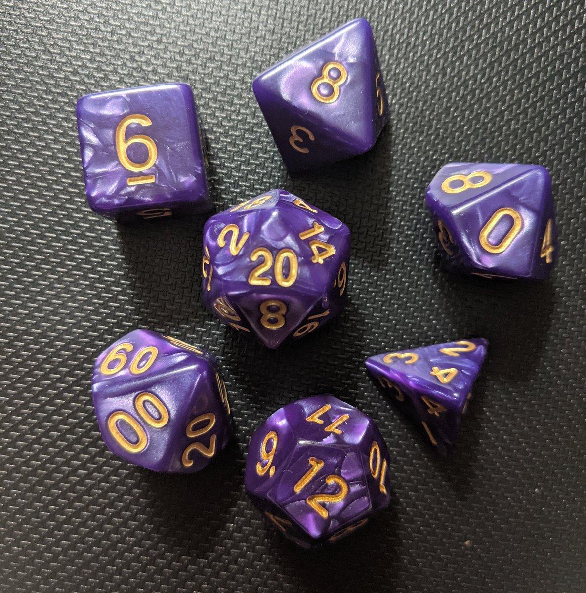 Thank you everyone for your entries to win the giveaway for these gorgeous purple swirl dice!
 I'm happy to announce that <a href="/Triss_Joy/">Triss Leder</a> was the randomly selected winner!! 

Please go check out her page and her affiliated works, such as the podcast, <a href="/Mythguidedpod/">Mythguided: Forgotten Lore</a> 

Thank you Triss!