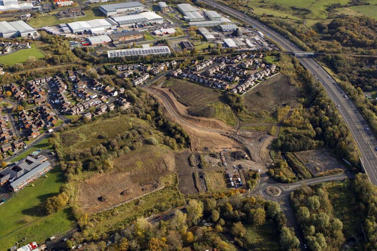 Aerial of the new road through Mill Bank Business Park providing access to future residential &amp; commercial development plots, which will also solve a bottleneck problem on Milking Lane.  Extensive works in the site are also planned to help alleviate flooding on Greenbank Terrace