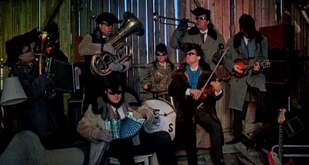 ленинградские ковбои едут в америку джармуш. ленинградские ковбои встречают моисея фильм 1994. ленинград ковбойс фильм. аки каурисмяки ленинградские ковбои. ленинградские ковбои едут в америку постер.