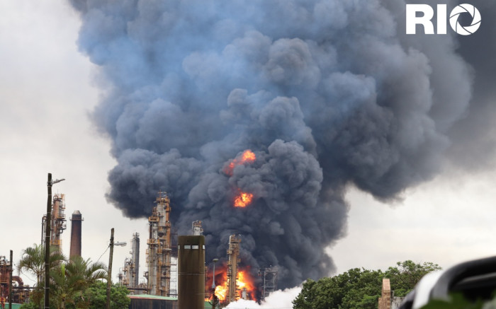 IN PICTURES Engine refinery explosion engulfed in flames and black &amp; blue smoke