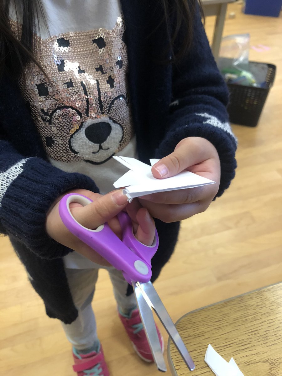 fdk122's tweet photo. Some of our friends used their scissor skills to cut shapes into paper to make their own snowflakes. We talked about how each snowflake is different and wondered how they are formed in the sky.... https://t.co/eiEhIQMSsF