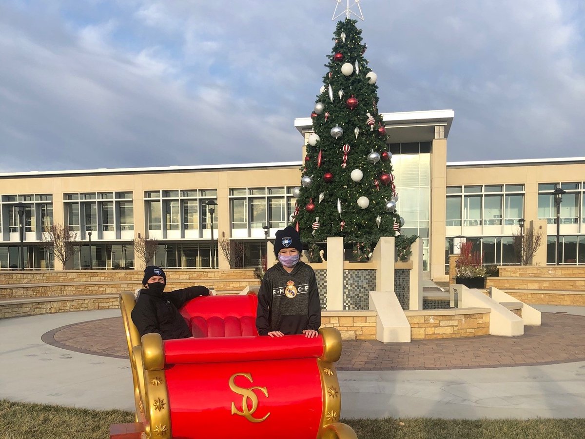 STAR1025's tweet photo. You have to check out the Tree &amp; SLEIGH at the The District at @PrairieTrail ! Kurt gets the details about "Toys for Toys Tuesday" from Ashley  ! https://t.co/0efqp5rCfx https://t.co/1E76CjW4lZ