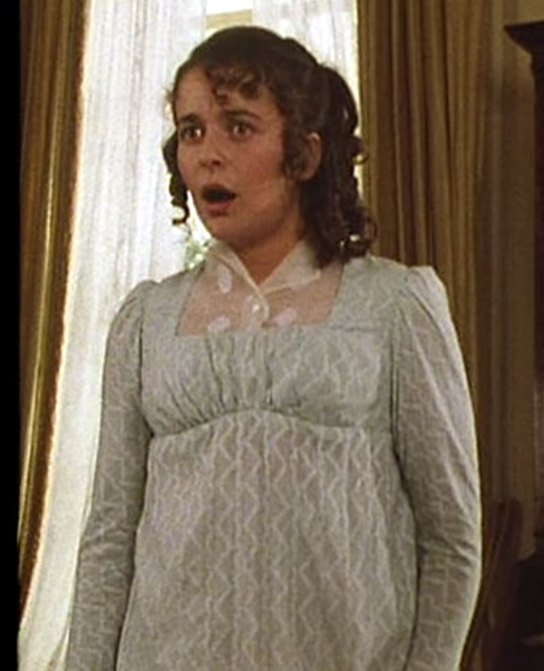 While we're here, this is not a good dress. The shoulder sections are too wide, the neckline is cut strangely, it's edged in piping (too early) so no adjustability (more on that anon), and the waistline has a forced rise at the centre, sewing in an effect that arises from wearing