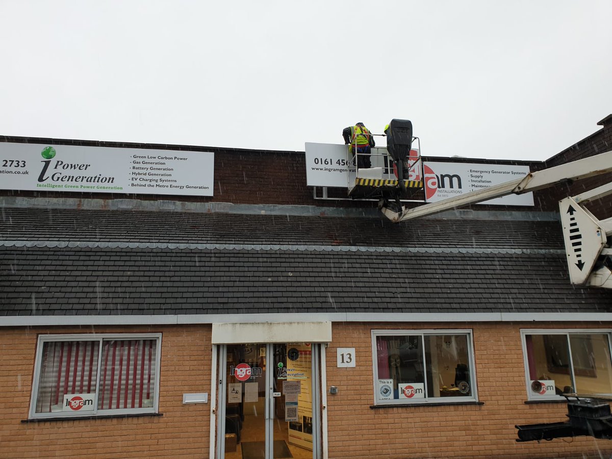 New signs going up today!... While snowing ❄️❄️