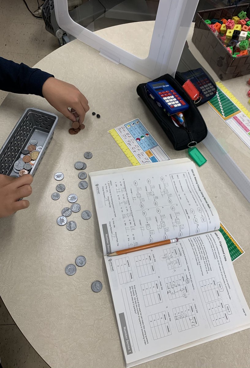 msbarone_'s tweet photo. Using manipulative materials to help solve math problems! #mathisfun #playmoney #snapcubes #basetenblocks #FridayFun https://t.co/VbbgKejdot