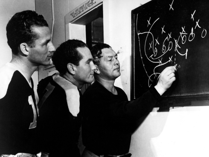 "Don lasted 11 years," said left halfback Cecil Isbell (between Hutson and Lambeau in this photo), who threw 33 of his 61 career TD passes to Hutson. "But I don't think he would have survived more than a couple if the Packers had not latched on to Larry Craig." (11/11)