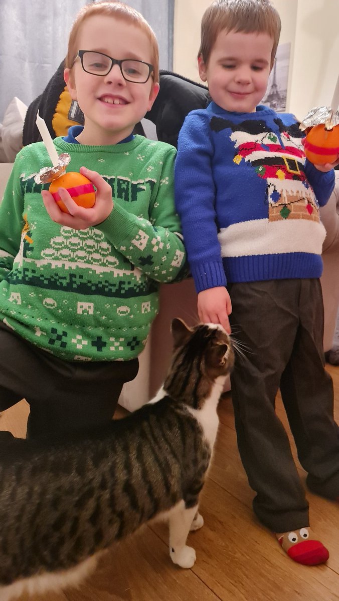 My boys 💖💖 please excuse the cat photo bombing 🤣🤣🐱 #christingle #ChristmasJumperDay #cat #christingleservice @WoodhouseClass @NewcomenClass