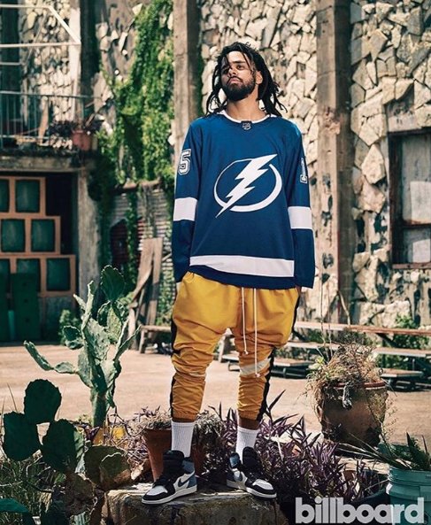 Rappers wearing hockey jerseys