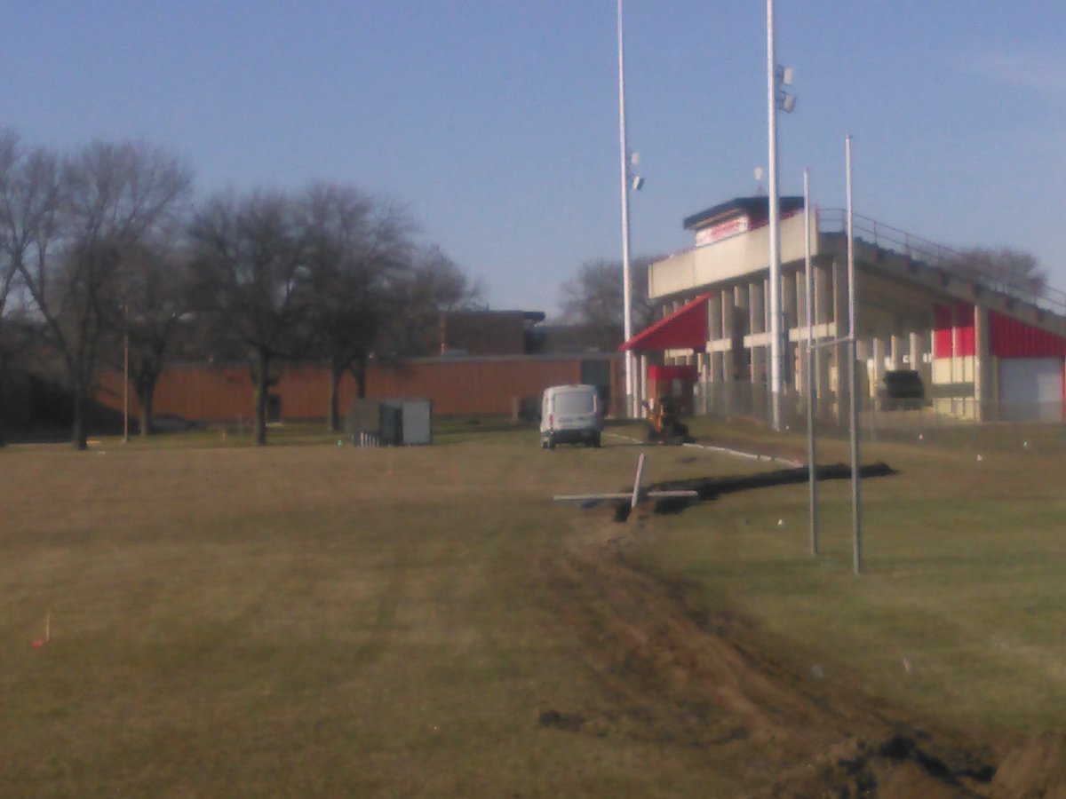 Construction work has started on the new fieldhouse/natatorium project <a href="/MCHS_MCCSD/">Mason City High School</a>. Right now it is "behind the scenes" work. 
Pictured here is the reroute of the main power feed beginning behind the stadium, the new transformer pad going in and the main power reroute trench.