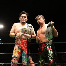 Toru Yano with things in his hands a thread