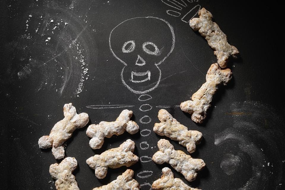 8. In Italy on All Saints Day you can FEAST ON THE BONES OF SAINTS!   (Sort of)Ossi di Morti (bones of the dead) are cookies shaped like bones and dusted with confectioners sugar to give it that dusty decomp look. (Photo by Jim Scherer. Styling by Catrine Kelty)