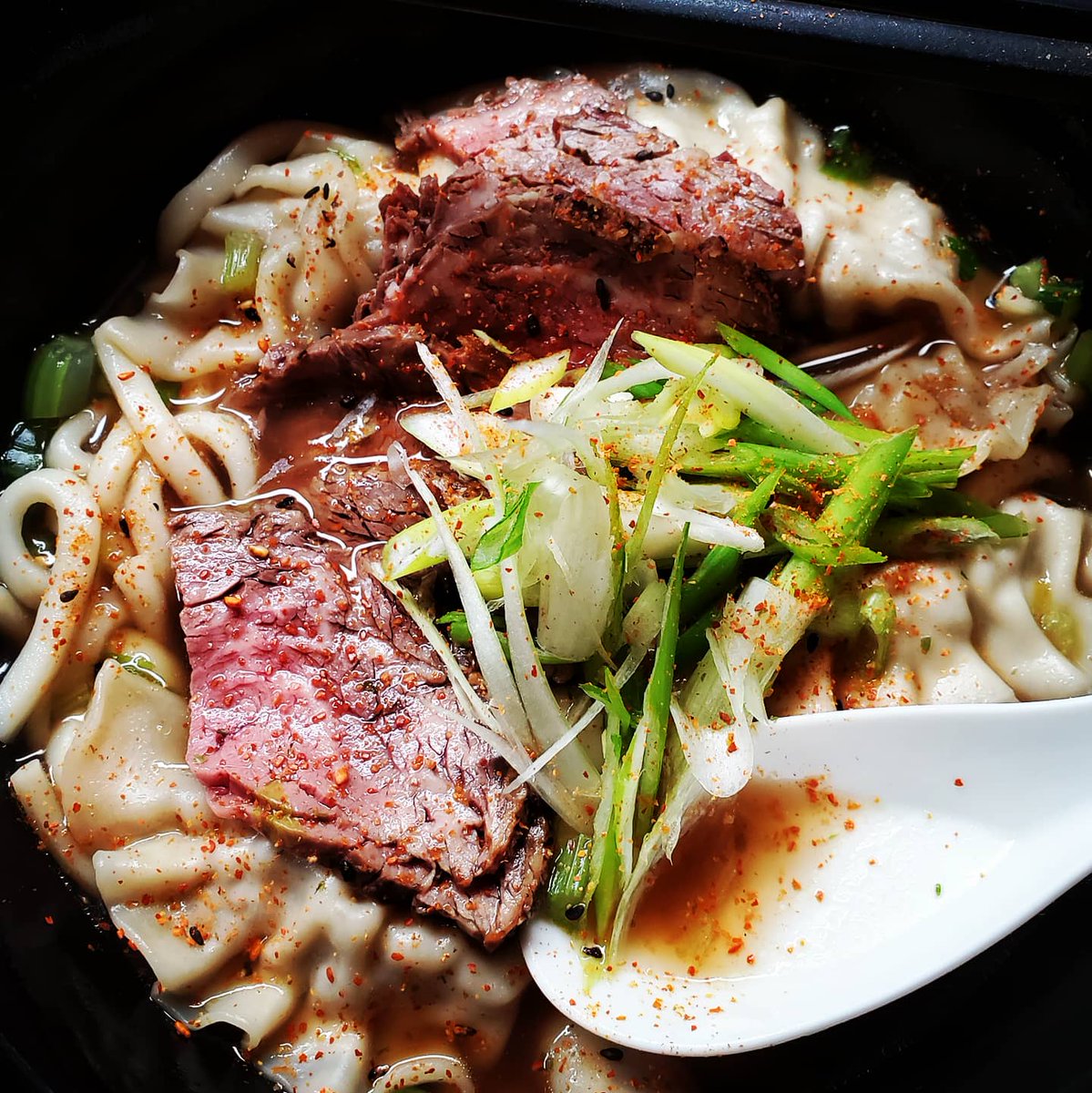 bentllama's tweet photo. Splitting migraine all day but you need to feed? Throw some pantry and leftovers in a pot.
Udon, bulgogi, beef stock, leftover Prime Rib, scallions, nanami togarashi, fish sauce
#myheadache #migraine #stillneedtoeat https://t.co/EIoqC4QLya