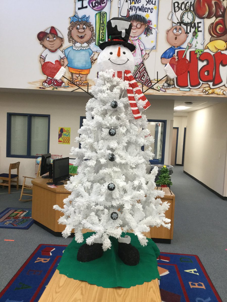 I got our Snowman Tree up in the library. I’m so excited to spread some holiday cheer this season even if nobody gets to come into the library, they can see the snowman from the windows.