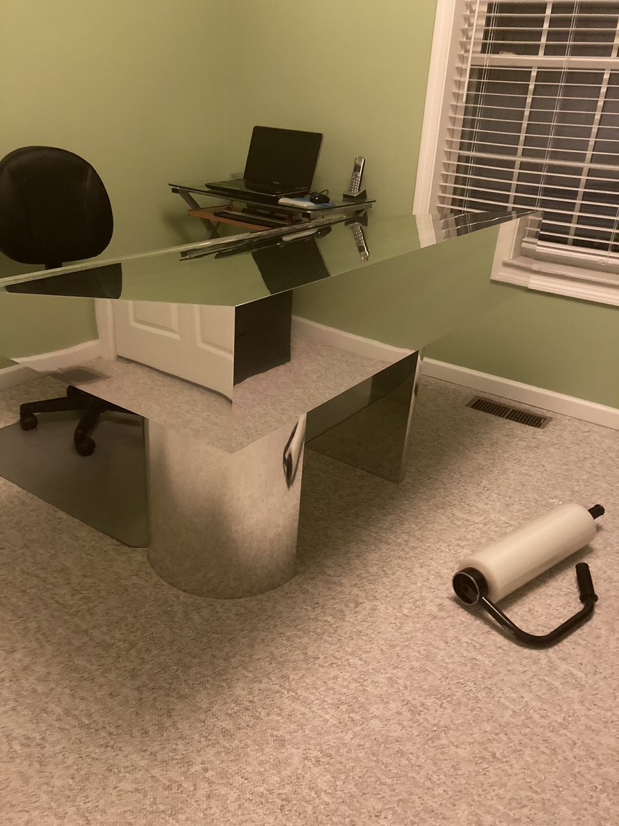 I present to you my moms truly unhinged mirror finish desk. What is this thing lol