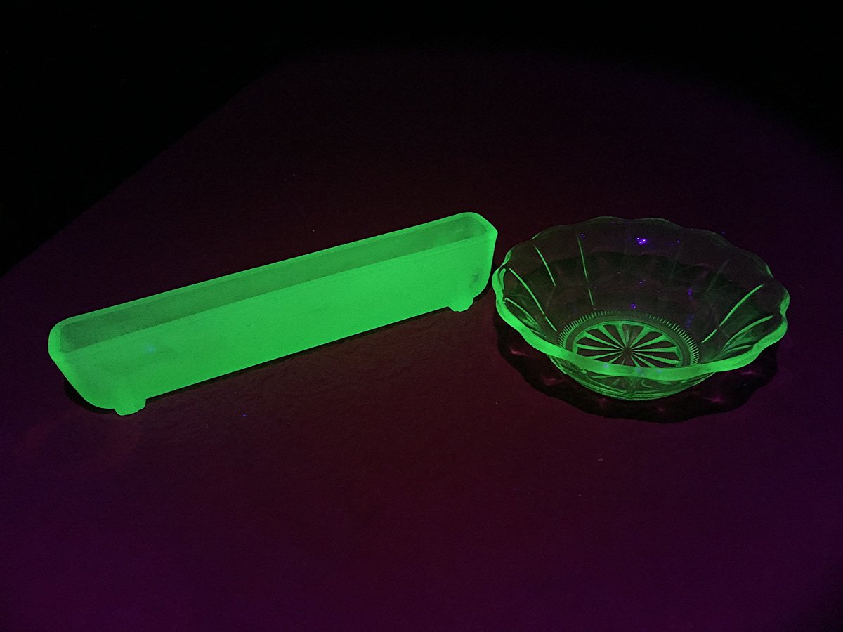 Uranium  #elementphotos. Yellow powder is uranyl acetate (UO2(O2CCH3)2.2H2O). Green glass contains uranium salts doped into the glass to make it fluoresce in UV light.