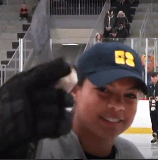 kelsey koelzer pointing at someone who needs to drink some water