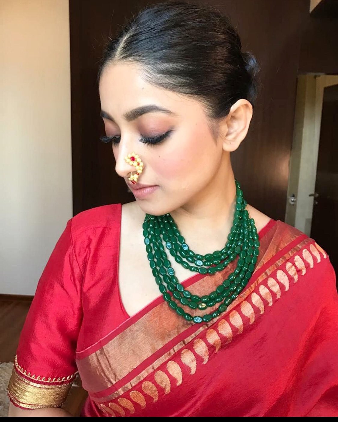 Red saree with green necklace deals