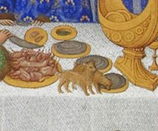 A bollock dagger, we've talked about that before.... https://twitter.com/FHHuntress/status/1335244152422981639Servant with very swanky hose walking on a matted rush floor.Fido gets a taste.Cats (?) on the table!