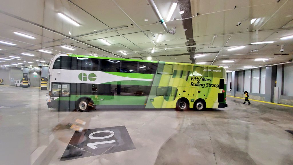 I'm a fan of this triangular piece on the second level of the new terminal. Captured the 50 Years Rolling Strong bus.  #gotransit  @Metrolinx