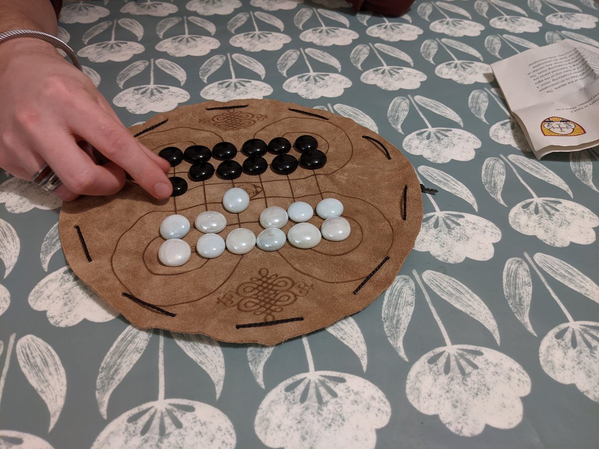 Finally teaching him Odin's Ravens by  @OspreyGames and playing some Surakarta which we picked up in Esslingen Christmas Market this time last year. #tabletopgaming