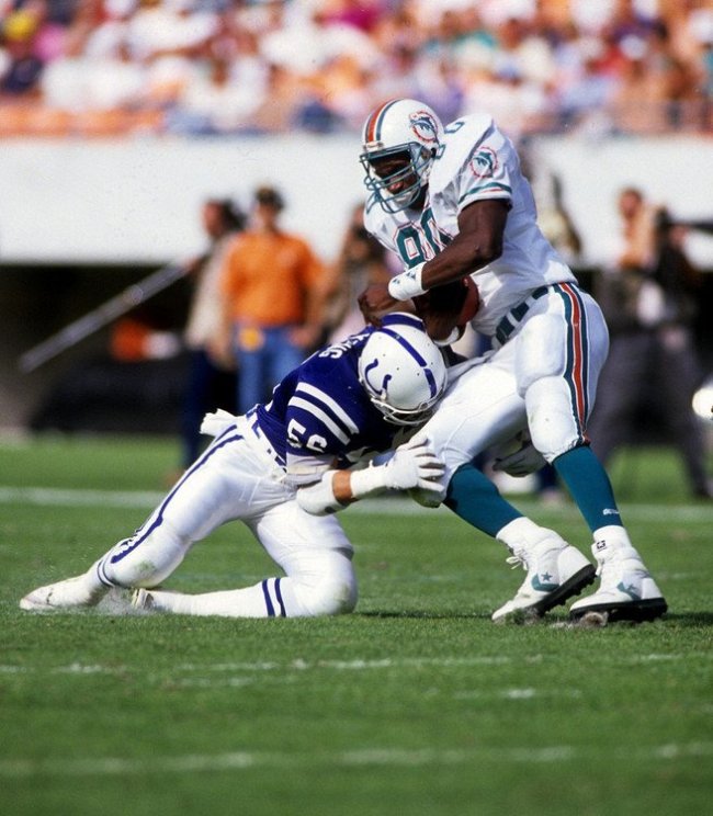 Seahawks LB Fredd Young is an elite TecmoBowl defender. Japanese programmers gave him great abilities. He was traded from Seattle to Indy in 1988 (about the same time Schroeder was traded) but is portrayed on the Seahawks roster. That big news apparently flew beneath their radar.