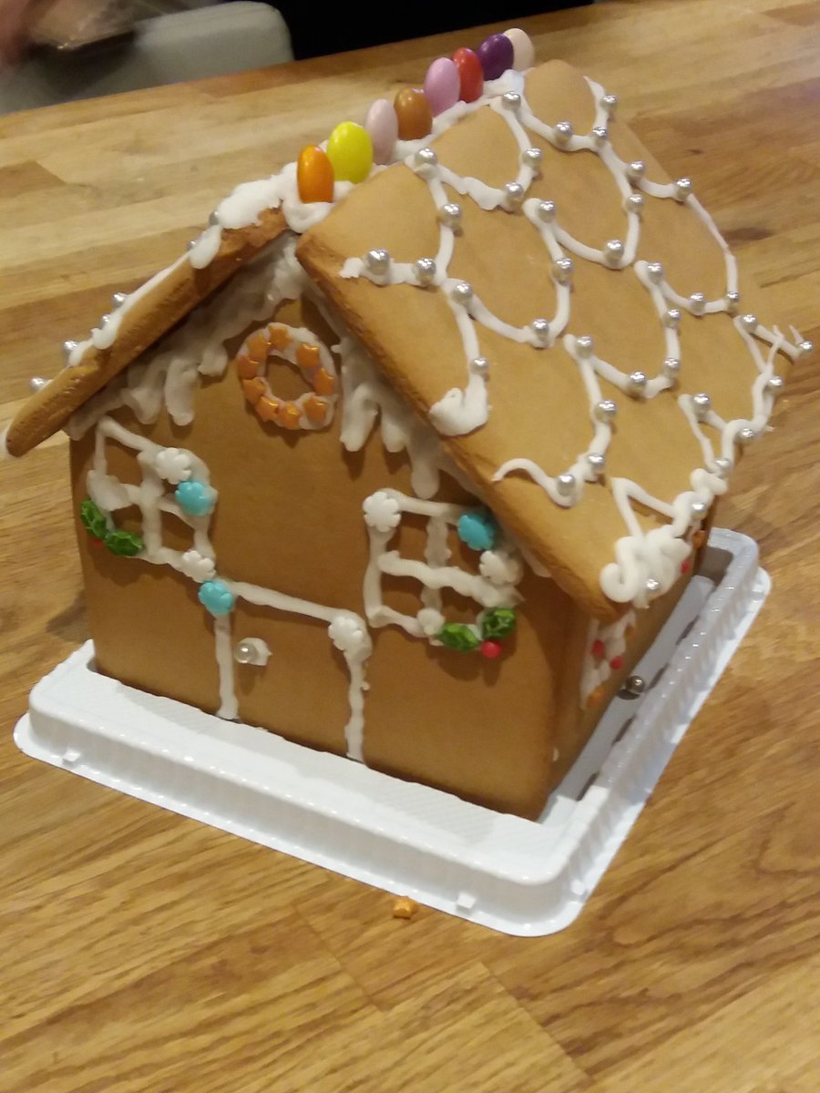 Our M5 boarders practising their decorating skills on this gorgeous Christmas gingerbread house! #StSwithunsBoarding #StSwithunsCreative #Christmas