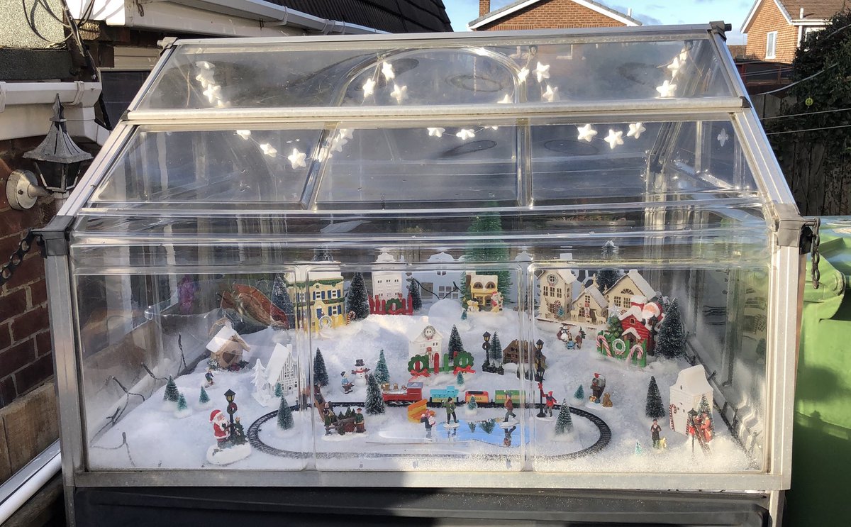 Ivimartha's tweet image. So this year I decided to do something different and put up a Christmas 🎄 village in my little greenhouse so that the kids can see and hopefully enjoy it when they walk past the house on their way to and from school. 🙂