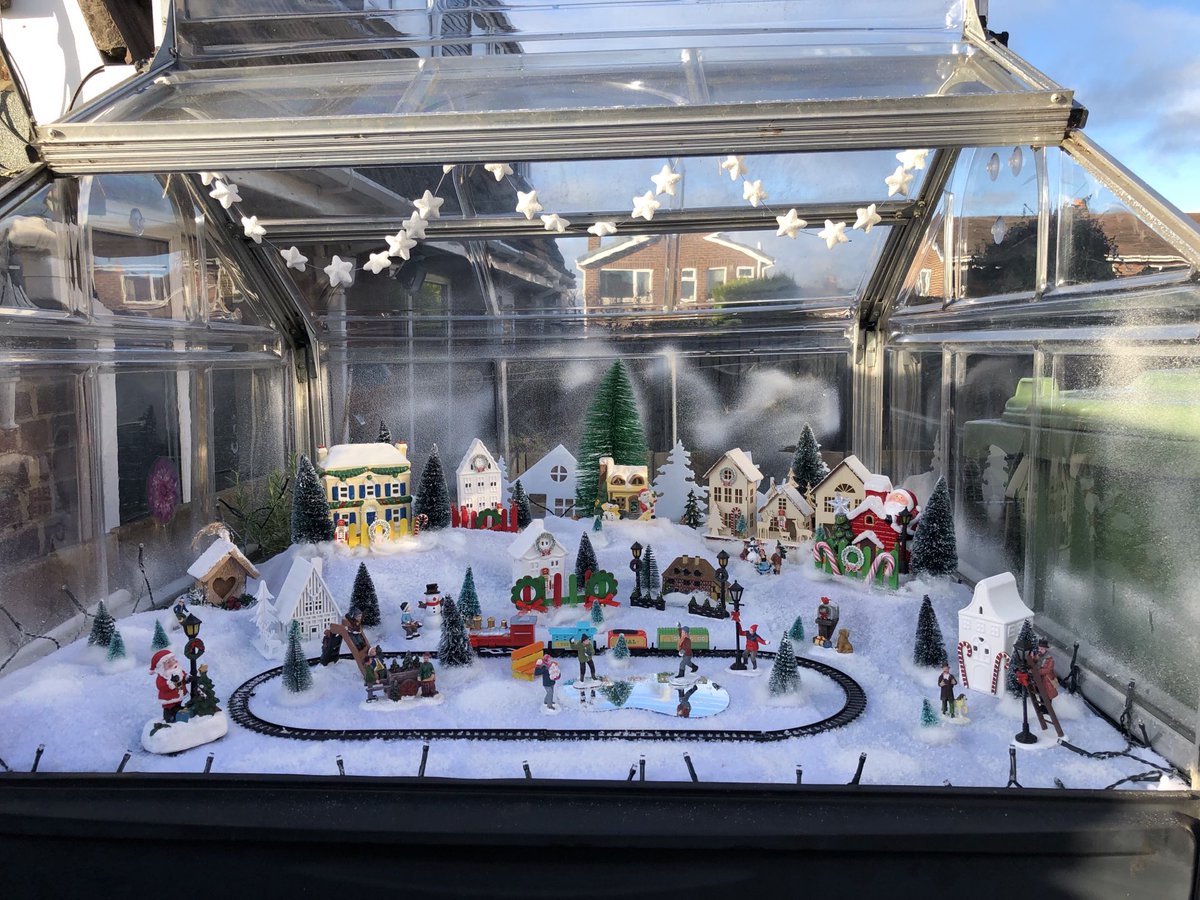 Ivimartha's tweet image. So this year I decided to do something different and put up a Christmas 🎄 village in my little greenhouse so that the kids can see and hopefully enjoy it when they walk past the house on their way to and from school. 🙂