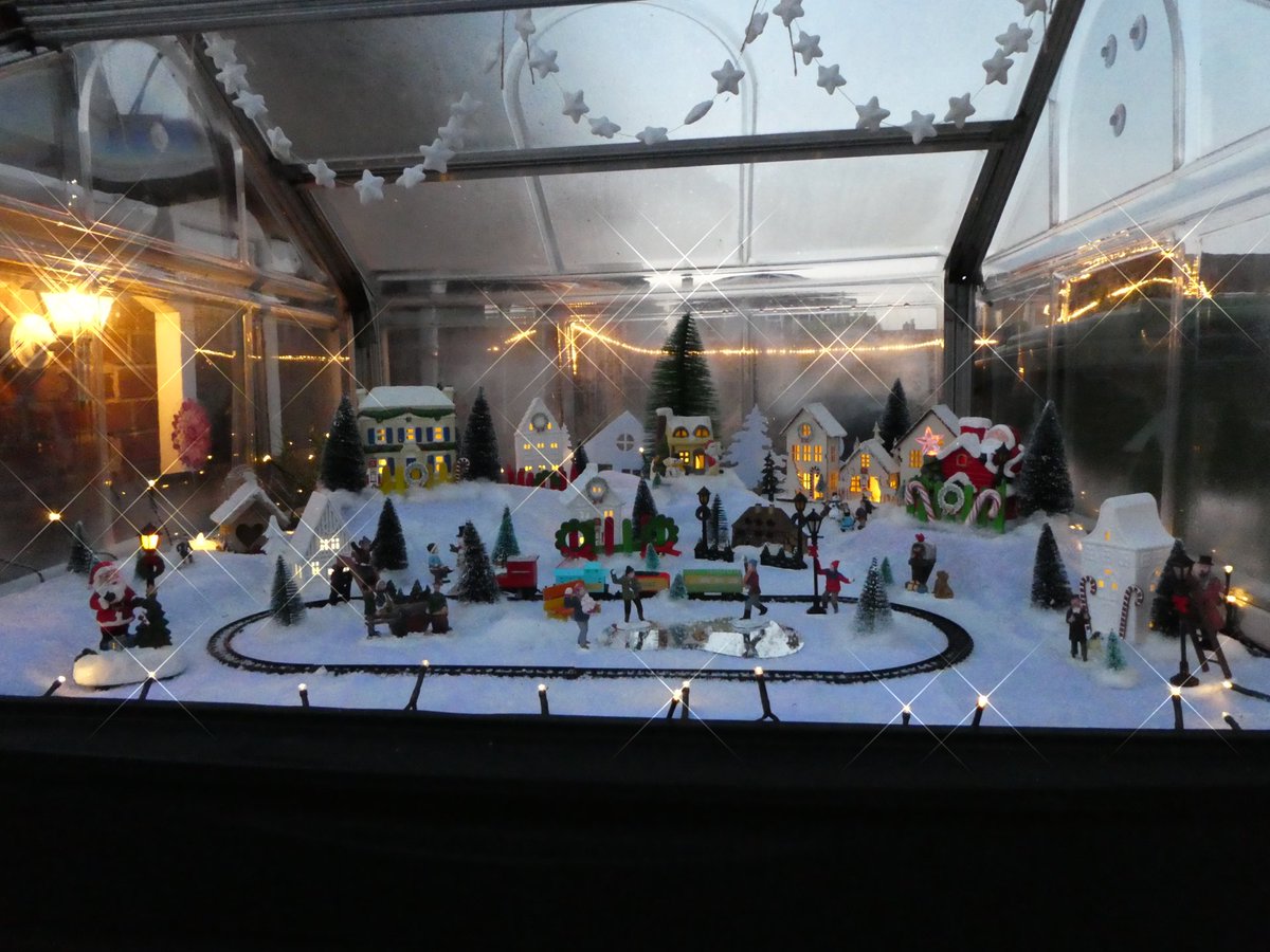 Ivimartha's tweet image. So this year I decided to do something different and put up a Christmas 🎄 village in my little greenhouse so that the kids can see and hopefully enjoy it when they walk past the house on their way to and from school. 🙂