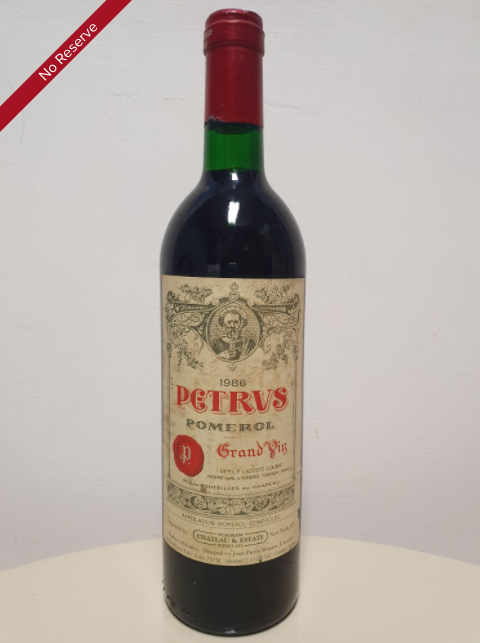 One for the Xmas table - Pétrus, one of the world`s rarest and most expensive wines. This bottle from the 86 vintage is offered with no reserve. Currently retails at over £1,000 a bottle. bidforwine.co.uk/auction/lot/pe…