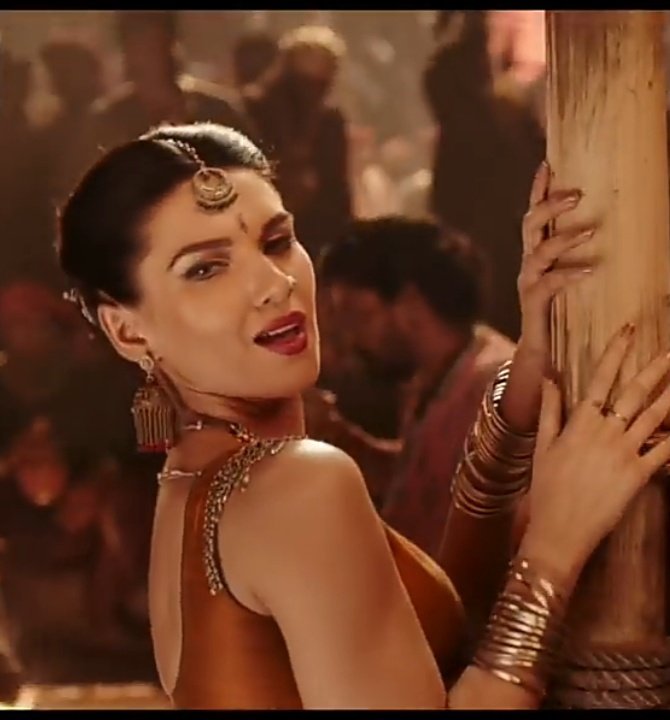 Haechan as dancer in orange blouse