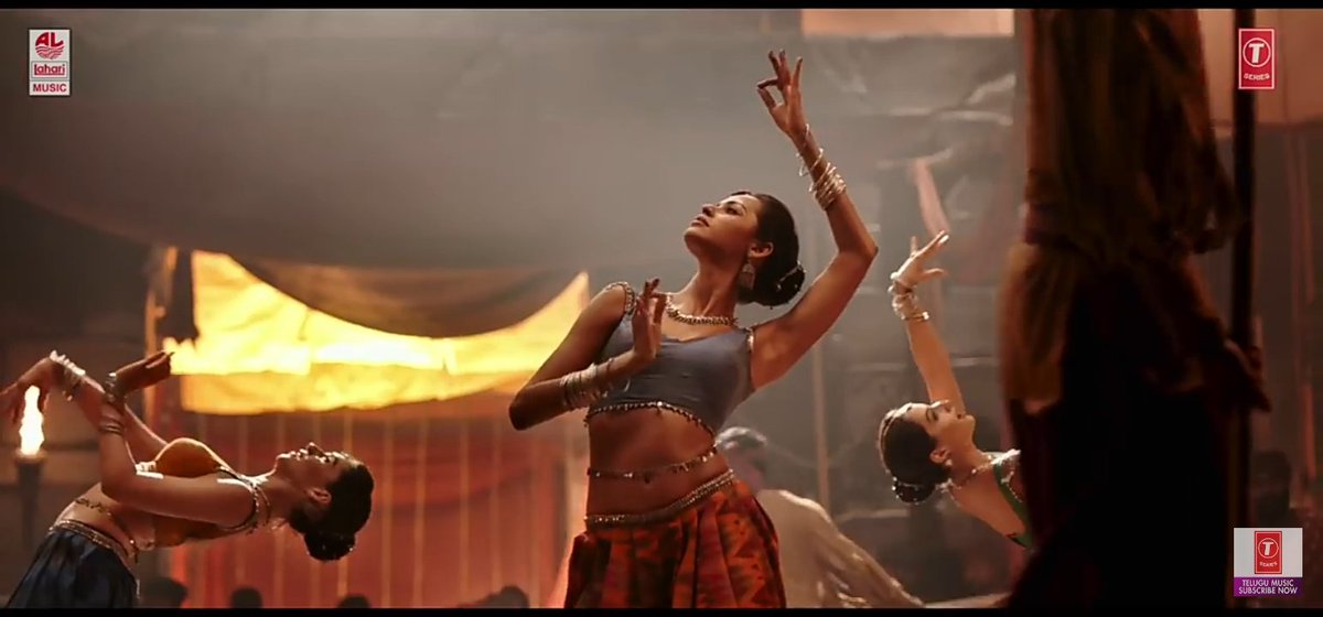 Xiaojun as dancer in blue blouse