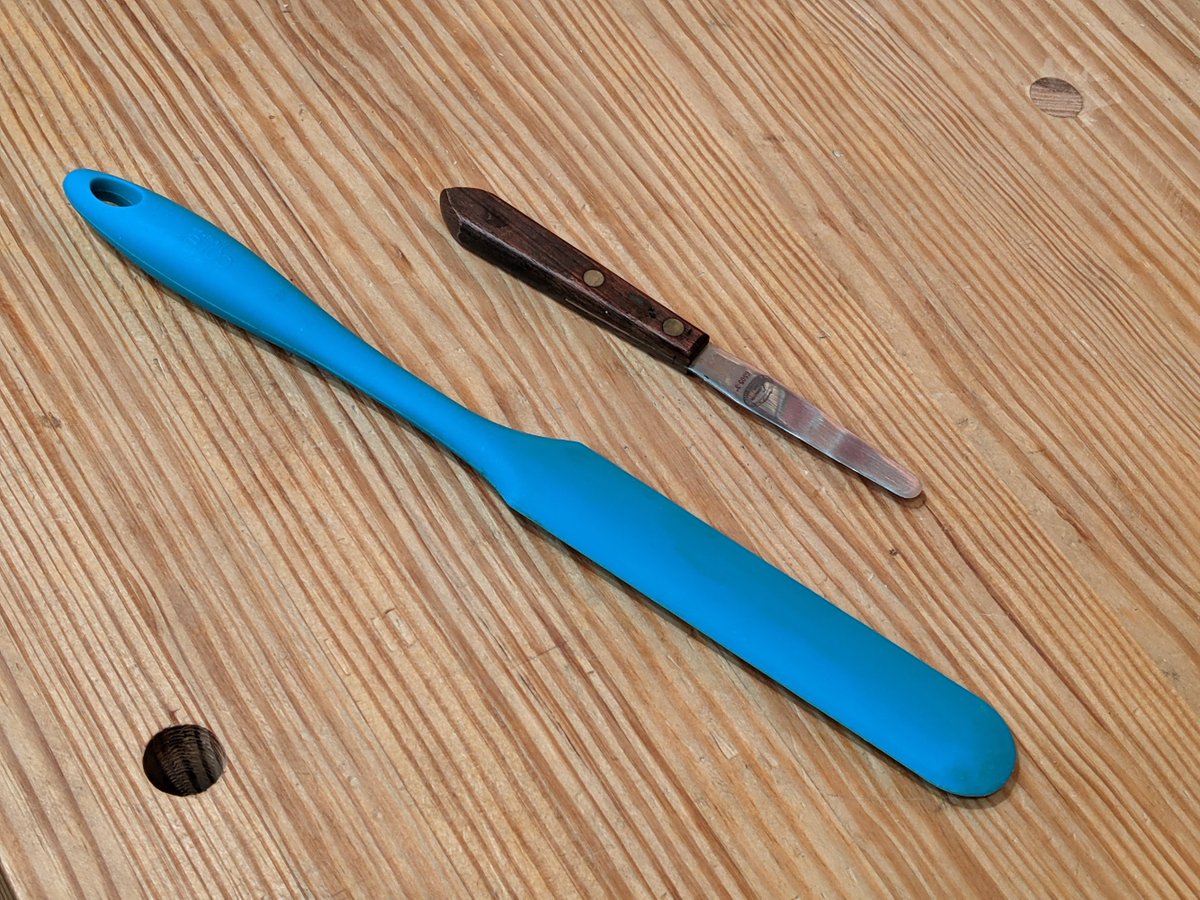 These are the two tools I use most frequently for spreading glue. Schwarz has written about palette knives and their usefulness when making repairs quite a bit recently. The silicone icing spreader is great for bigger glueups and cleans up easily, it doesn't make the travel kit.