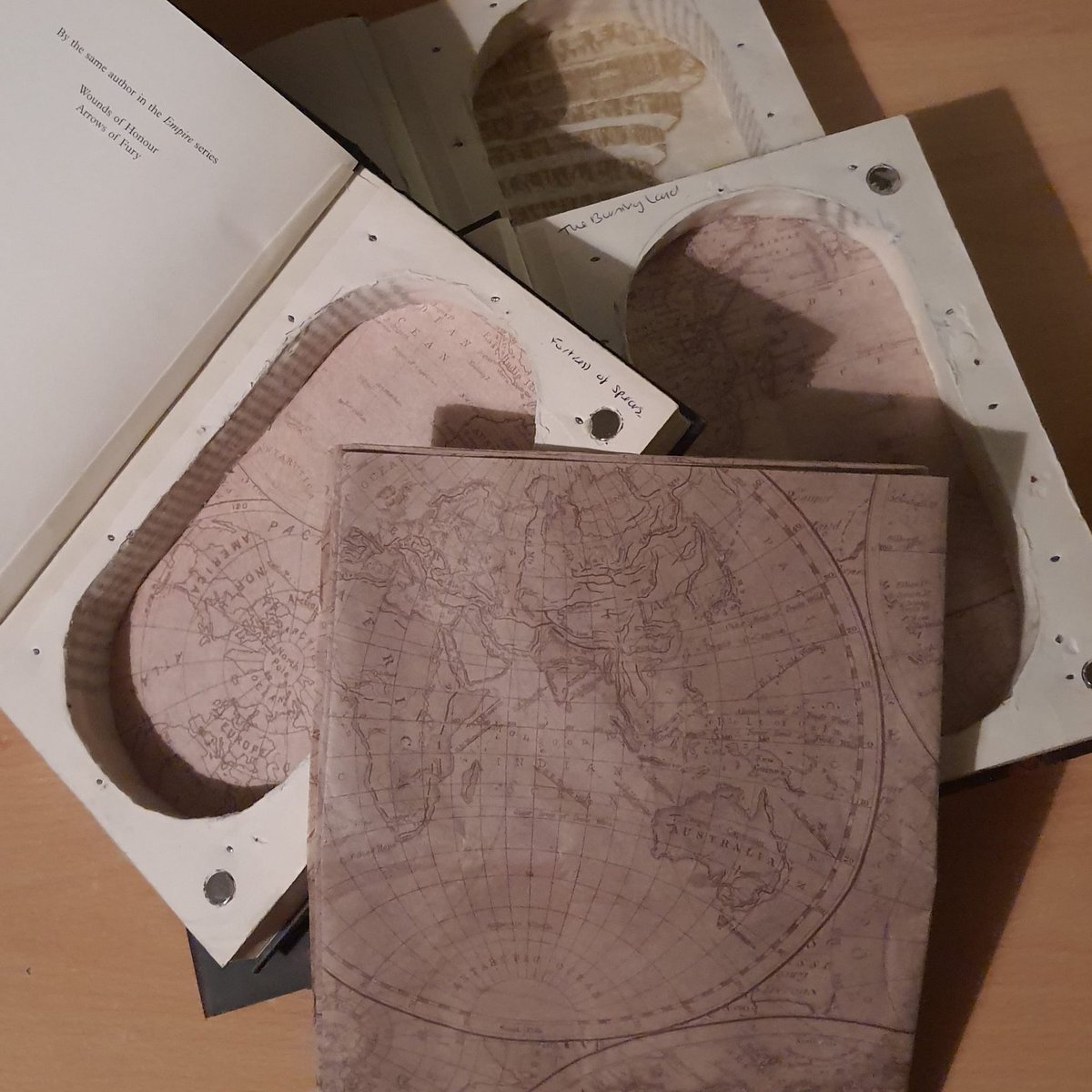Melissaydesigns's tweet photo. Repairing my three books back into their cases. 🙂♻️📚 I bought this map of the world paper. It looks really nice on my booksafes.
#booksafe #hollowbook #recycledbook #recycled #jewelrybox #upcycled #jewelrybook #etsy #etsyuk #hollowbooksafe #secretcompartment #gift #giftboxt https://t.co/j8nVlbwdYp