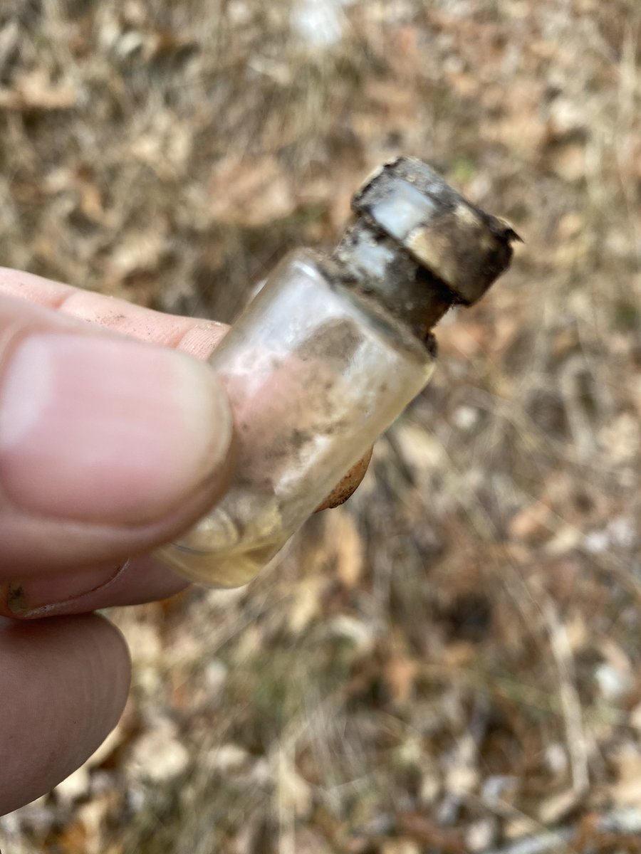 {thread} Our first find appears to be an old glass insulin/injection bottle!! Nearby we also found this corked bottle with an applicator. No idea what was in it!!