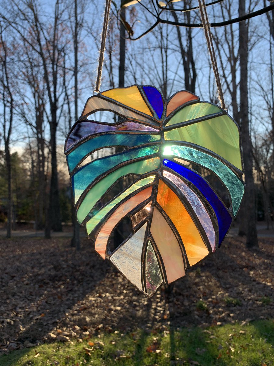 Took me a year and half to get skilled enough to execute this design but I’m finally making and selling technicolor #stainedglass #monstera leaves and it feels SO GOOD ✨🥰🍃