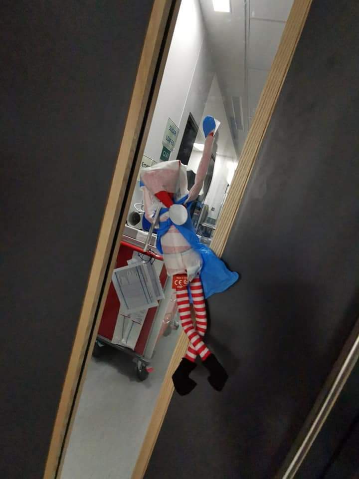 ClaireOrford's tweet photo. Even the #icuelf can't hide from COVID. Santa told him to stop messing about and pull his weight for a change so he donned his PPE and got stuck in @GrangeCritCare https://t.co/Ne13vkk5ES