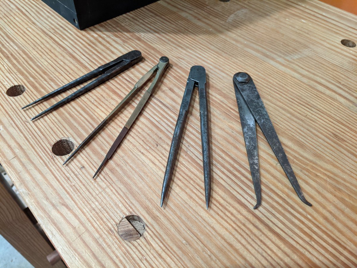 Dividers and an inside caliper. The steel dividers are a bit rough but work, the brass ones are a bit lightweight for woodworking. The inside calipers came in a box of "machinist tools" and I find it occasionally useful.